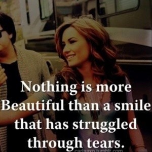 nothing-is-more-beautiful-than-a-smile-that-has-struggled-through-the-tears-inspirational-quotes